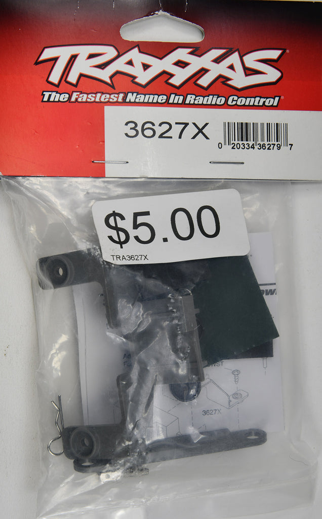 Traxxas Battery Hold-Down (Grey) (1) / Receiver Hold-Down (Grey) (1) / Metal Posts (2)/ Spacers (2)/ Body Clips (2)/ Servo Tape/ Adhesive Foam Pad TRA3627X